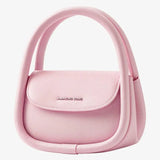 Pastel pink handbag with Amazing Song logo, modern curved handle, on white background