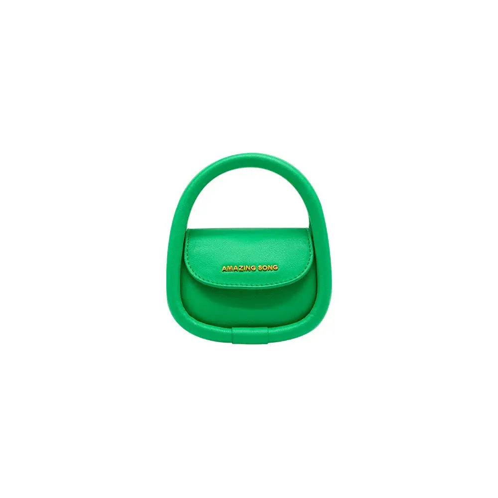 Amazing Song green mini handbag with top handle and gold logo on white background