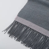 Amazing Song grey scarf with light pink border and fringe detail on white background