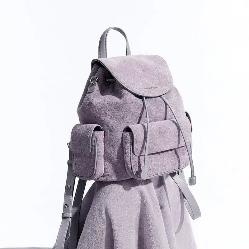 Light purple suede backpack with front pockets, stylish design, Amazing Song official website