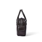 Side view of a dark brown leather handbag with white stitching and pocket, Amazing Song