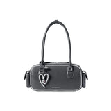 Amazing Song black handbag with heart keychain and double handles on white background
