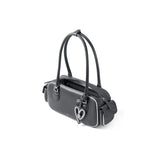 Black Amazing Song handbag with double straps, heart charm, and white trim on white background