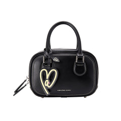 Amazing Song black handbag with heart charm, white stitching, and logo on front