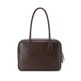 Dark brown leather handbag with double handles, featured on Amazing Song official website