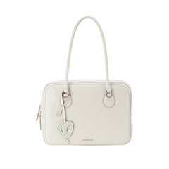 Elegant cream handbag with heart-shaped tag, Amazing Song brand, official website product
