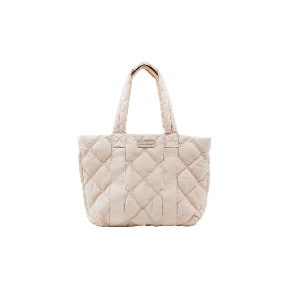 Quilted beige tote bag with dual handles, featured on Amazing Song official website