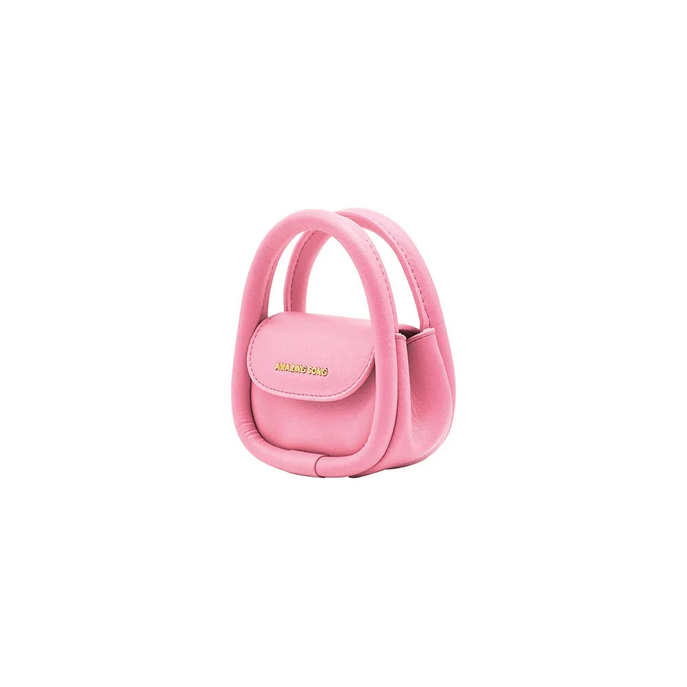 Amazing Song small pink handbag with double handles and gold logo on white background