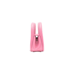 Side view of a small pink leather handbag against a white background, Amazing Song style