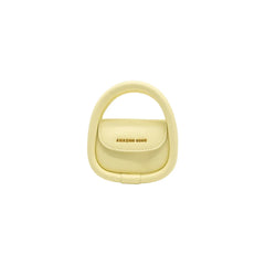 Amazing Song yellow mini handbag with rounded handle on white background