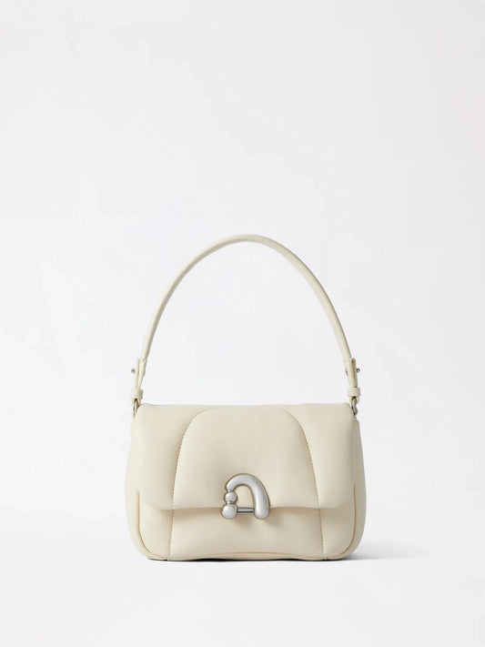 A clean structured cream leather crossbody bag with quiet hardware