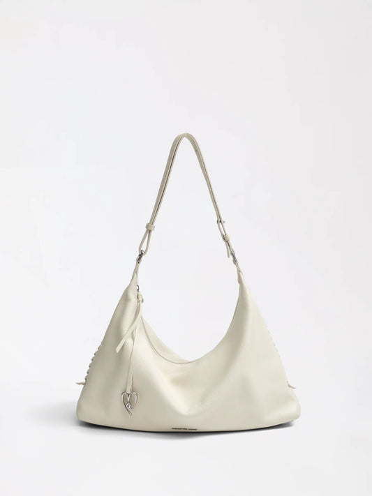 Love & Ta woven hobo bag in genuine leather, a soft rounded self-care gift you carry every day
