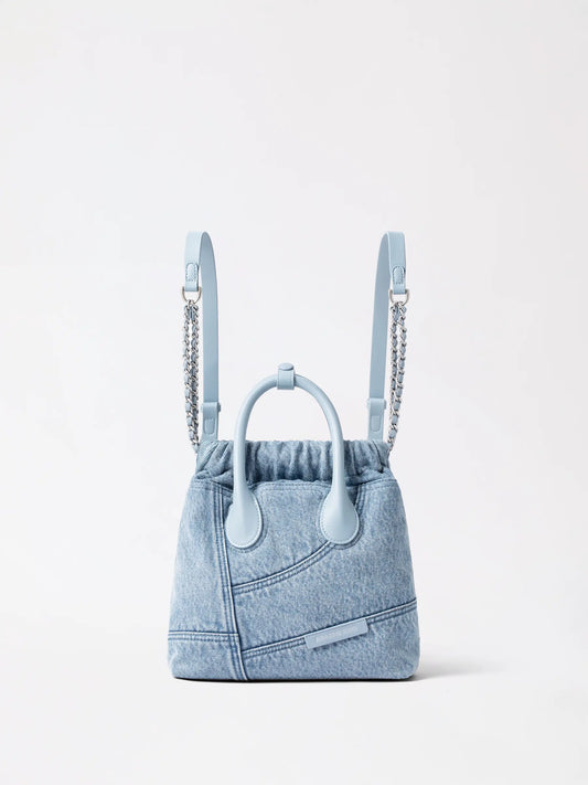 Small denim hobo backpack worn on the back, soft slouchy body with twin straps