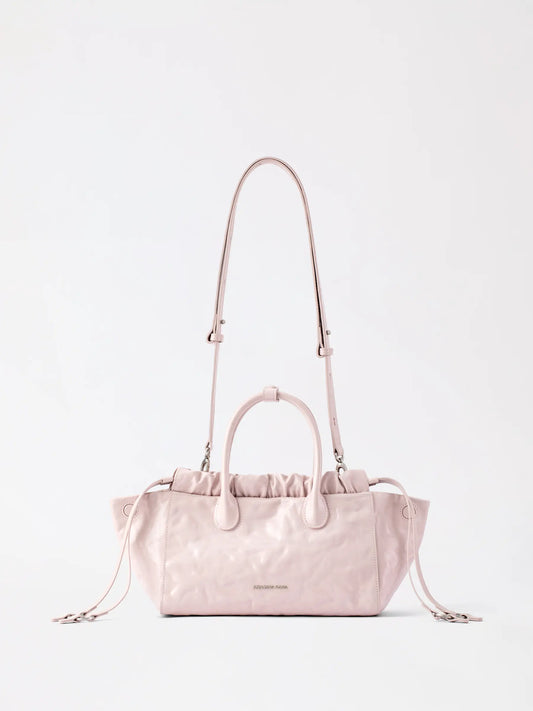 AMAZING SONG cloud hobo bag in top-grain cowhide held as a small crossbody