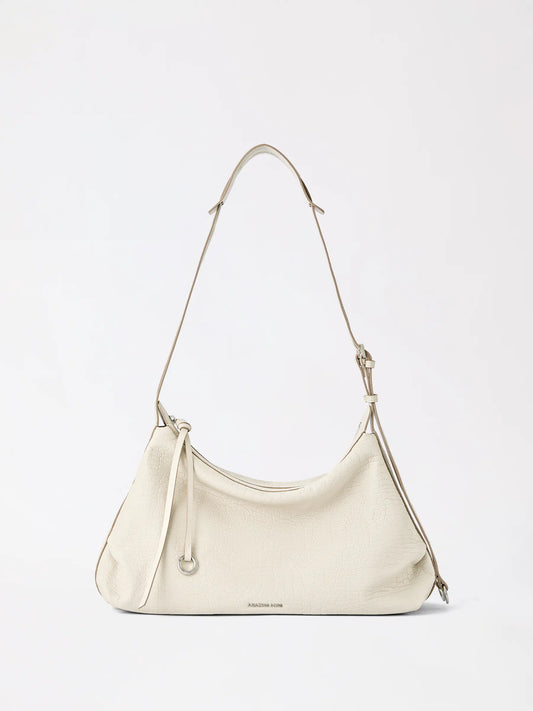 The AMAZING SONG donut hobo in top-grain cowhide, warm caramel tone
