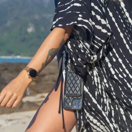 a person wearing a black and white dress with a tattoo on it