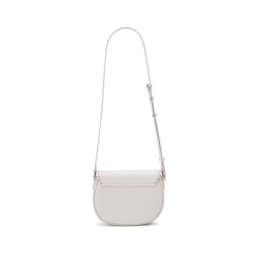 Minimalist white leather crossbody bag with adjustable strap on white background