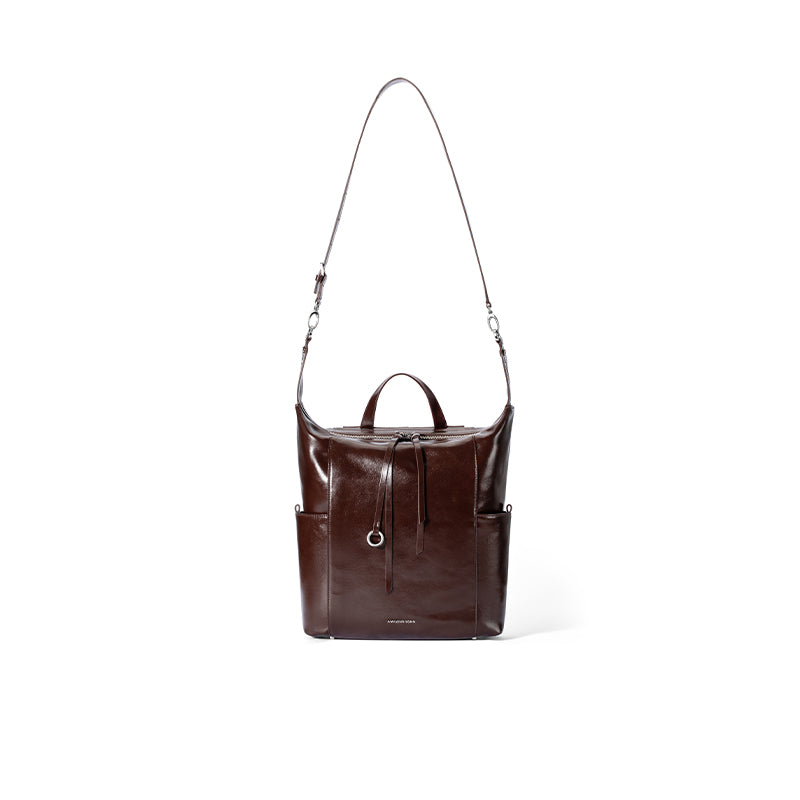 Dark brown leather backpack with top handle and shoulder strap, Amazing Song official website