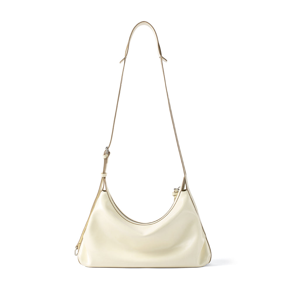 Cream shoulder bag with adjustable strap on white background, Amazing Song official website