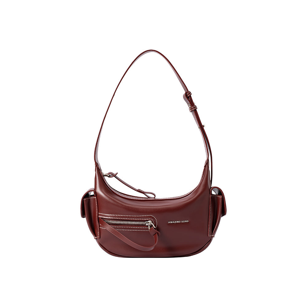 Amazing Song brown leather shoulder bag with front zipper pocket on white background