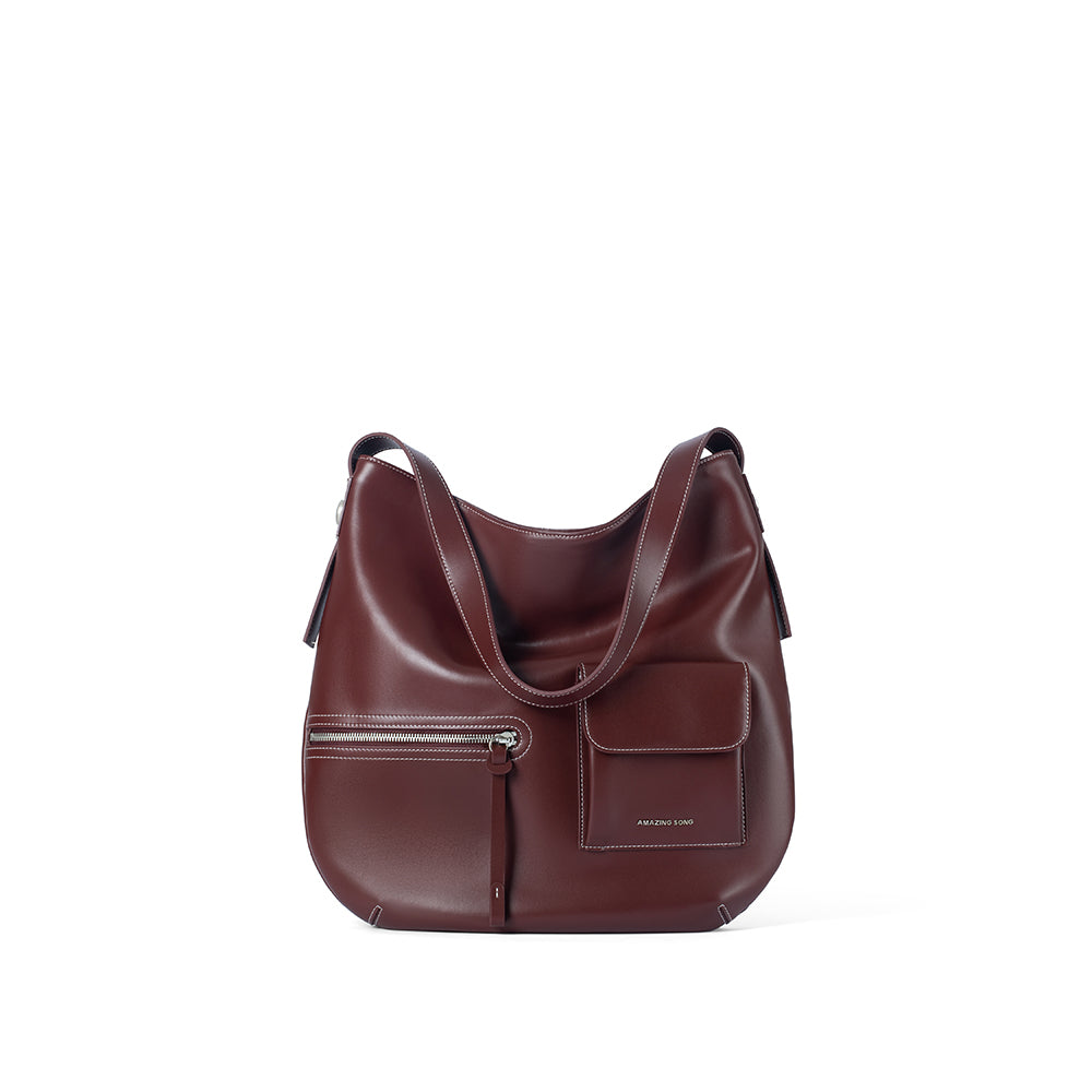 Amazing Song burgundy leather shoulder bag with front pocket and zipper detail