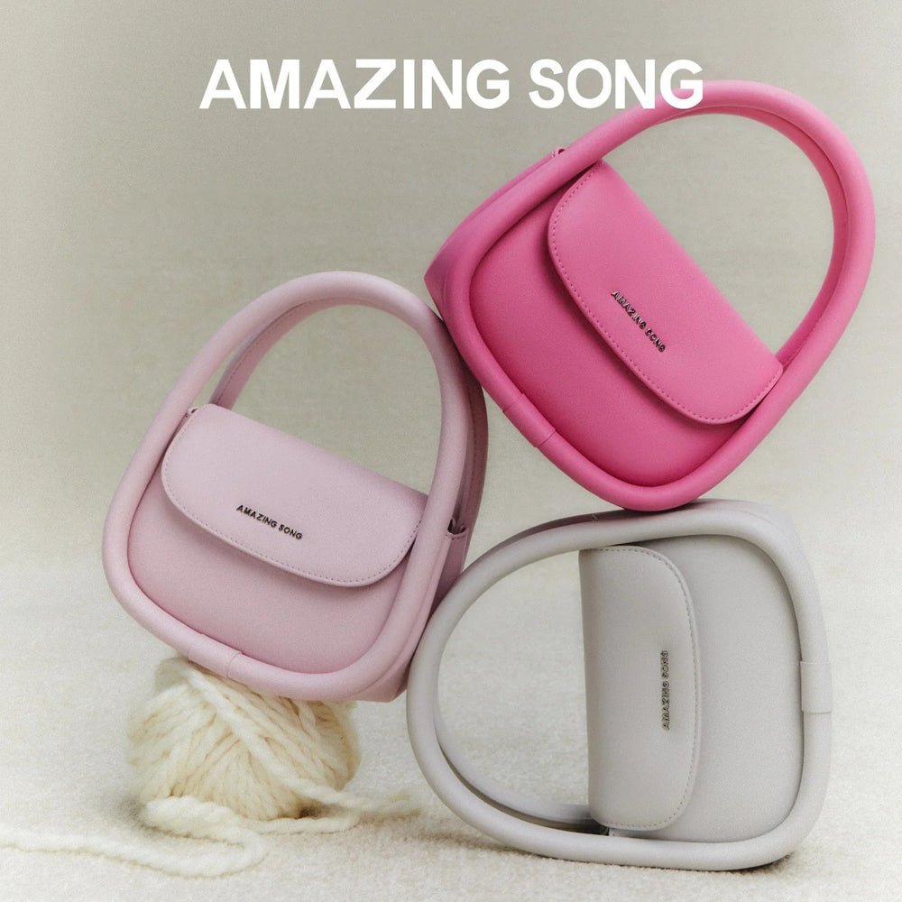 Amazing Song handbags in pink, rose, and white on soft beige background, official branding