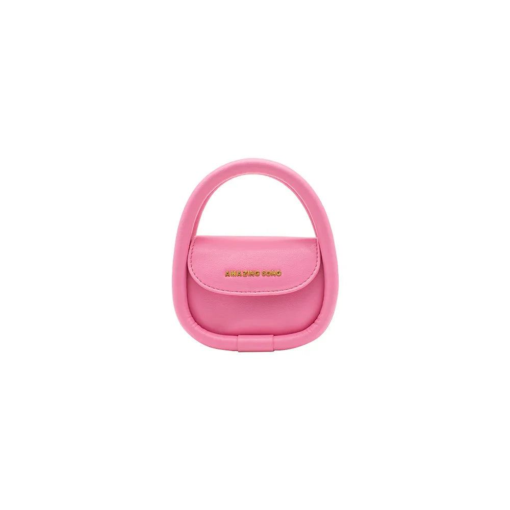Amazing Song pink mini handbag with gold logo on white background