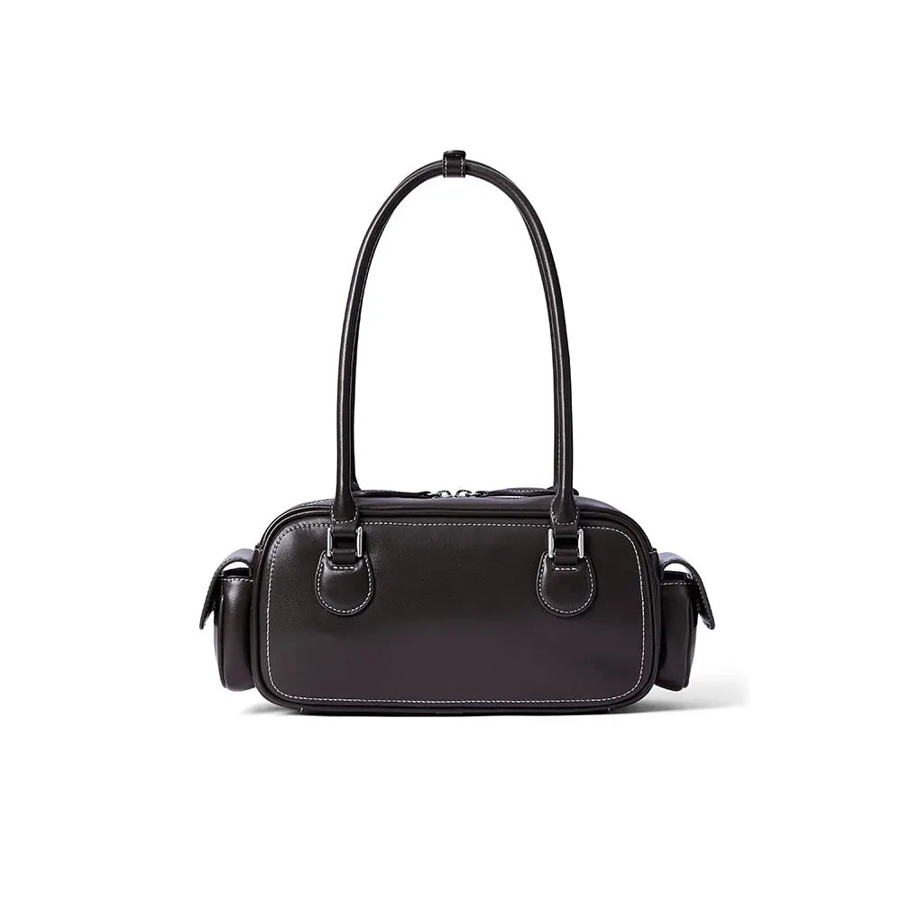 Black leather handbag with double handles and side pockets on white background, Amazing Song