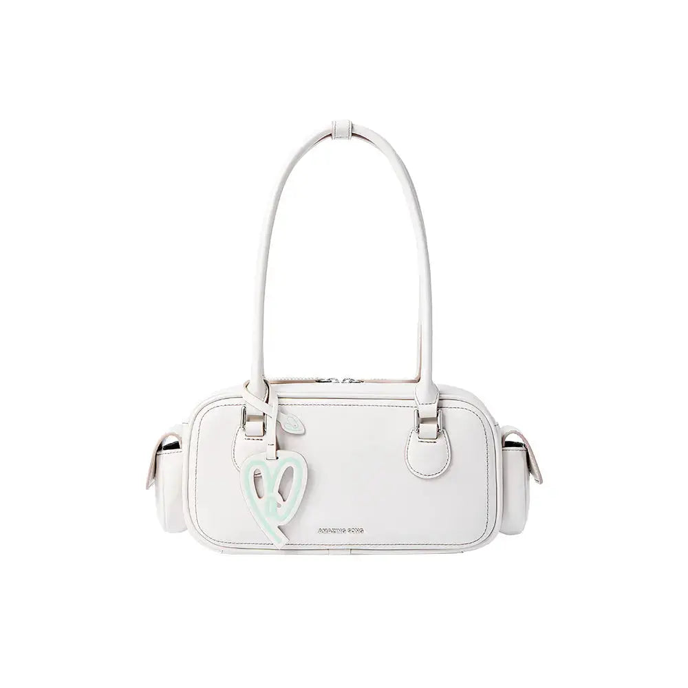 White Amazing Song handbag with double handles and heart-shaped charm on white background