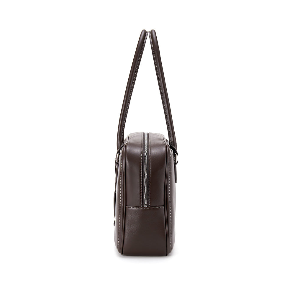 Side view of a brown leather tote bag with zipper, Amazing Song official site product
